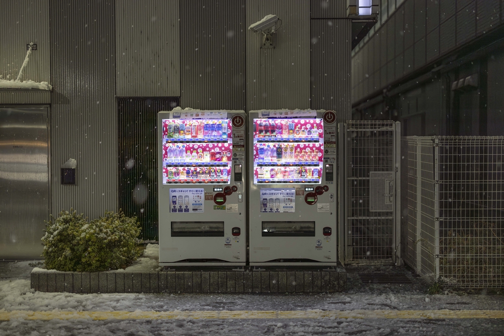 从国民骄傲到企业包袱日本自动售货机上演“大撤退”(图1)